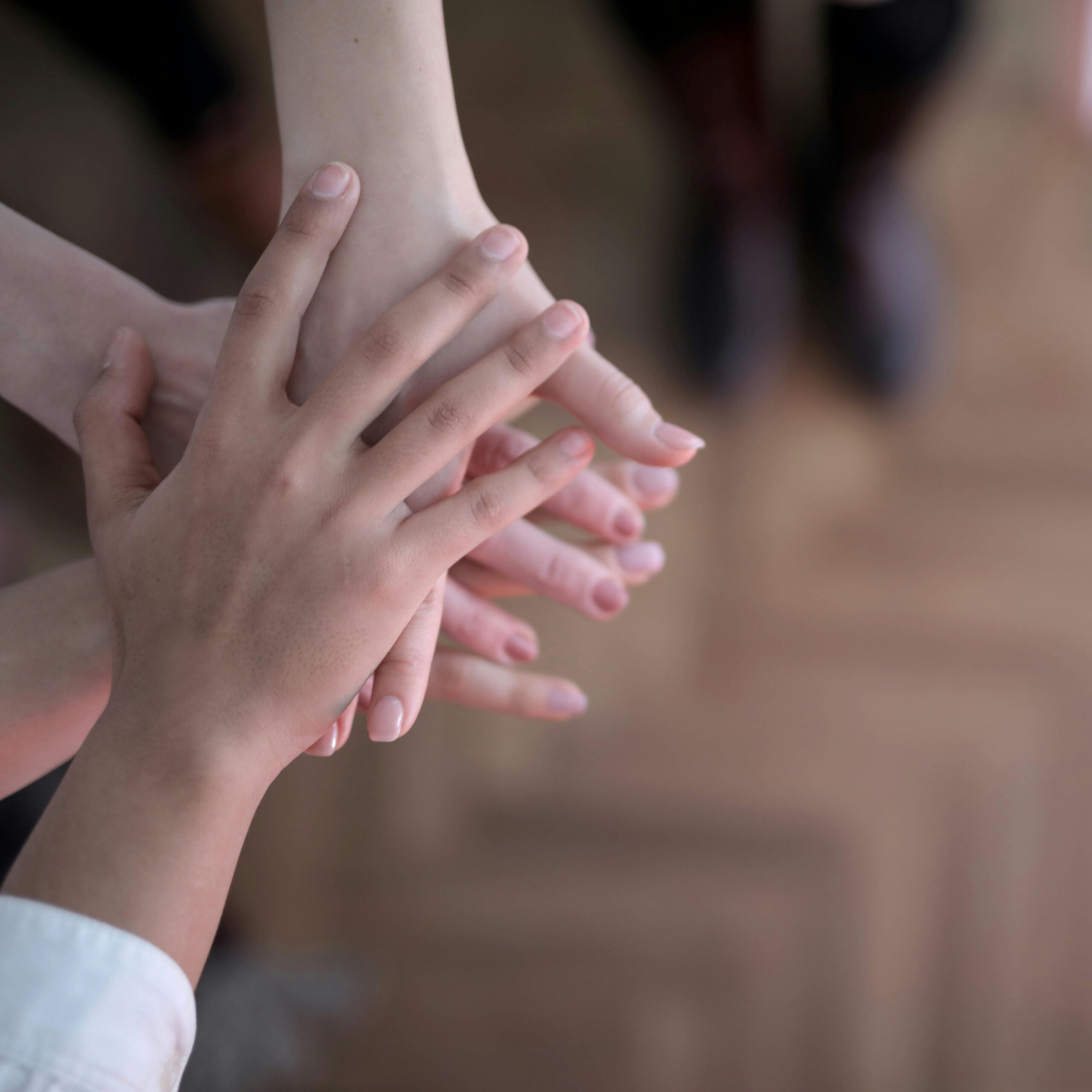 Overlapping hands, supporting local